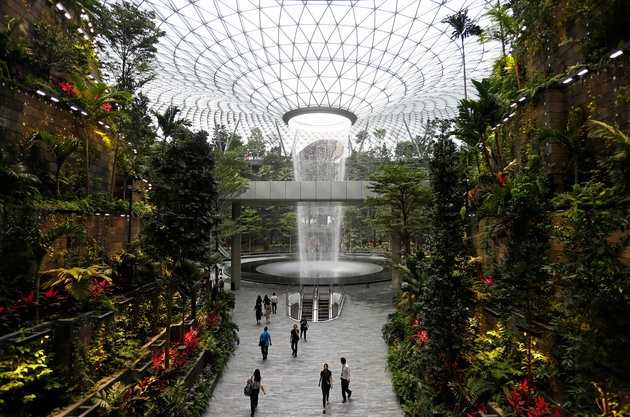 The 40-metre high Rain Vortex, which is the world's tallest indoor waterfall, is seen from inside Jewel Changi Airport in Singapore